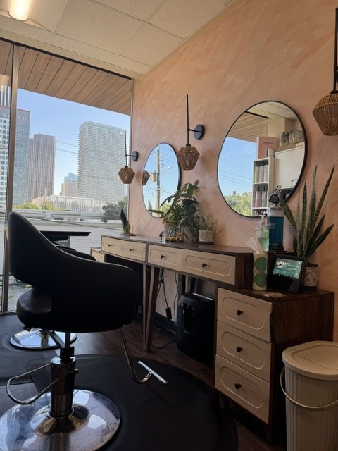 The Editorial — Midtown Houston suite with skyline view